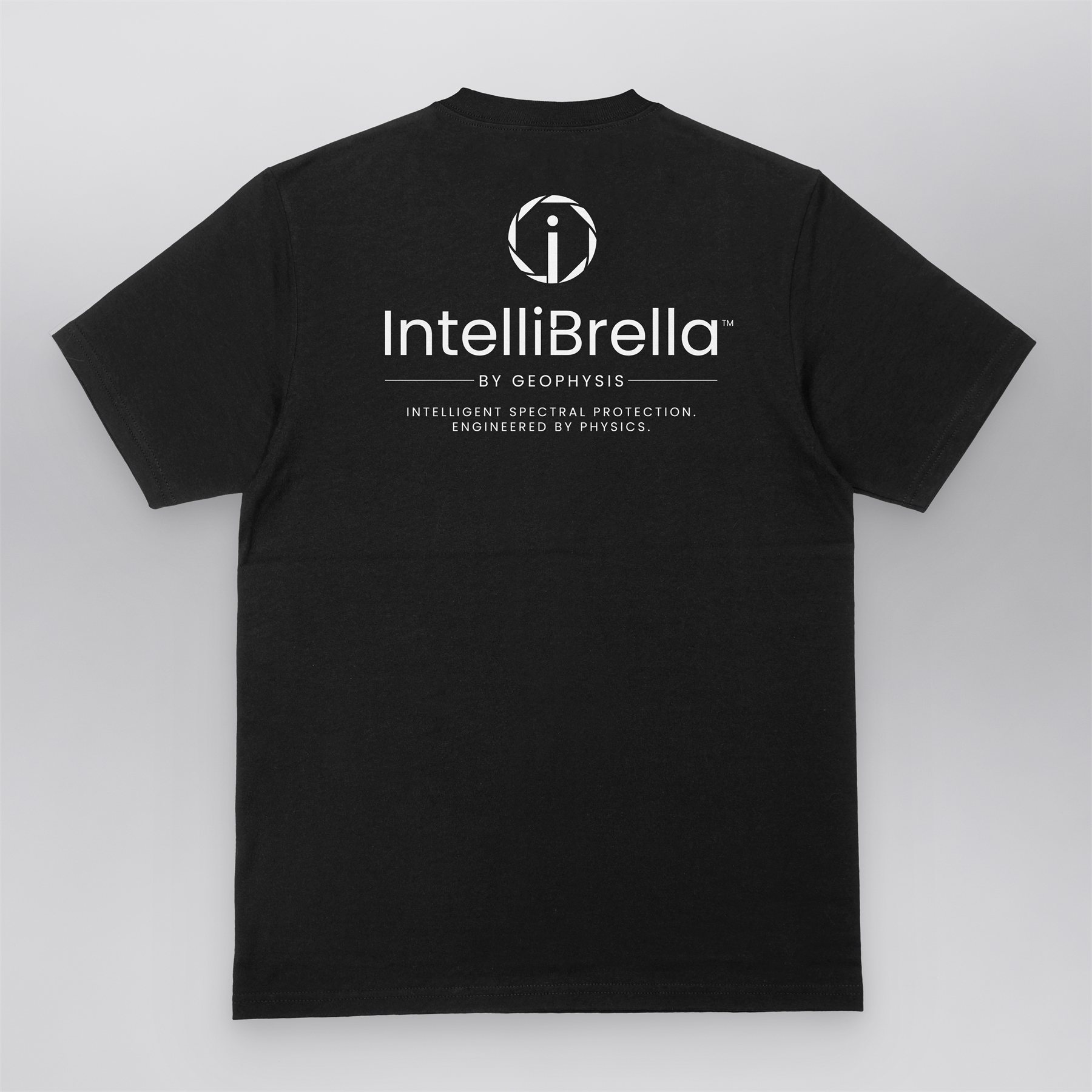 Black IntelliBrella&trade; t-shirt, back view, with the white aperture mark, wordmark, BY GEOPHYSIS rule and the Intelligent Spectral Protection line printed across the shoulders